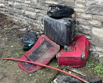 SEWER BLOCKAGE - SUITCASES